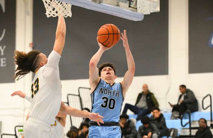 Connor Amundsen (30) goes up for two of his 25 points.